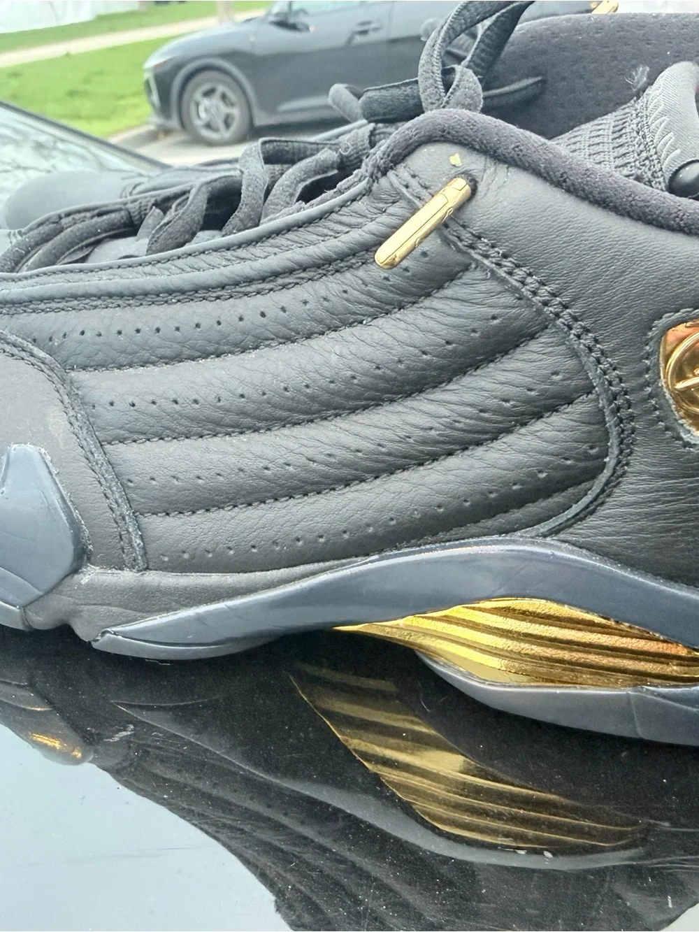 Men's Black Jordan’s Athletic Sneakers with Gold Accents